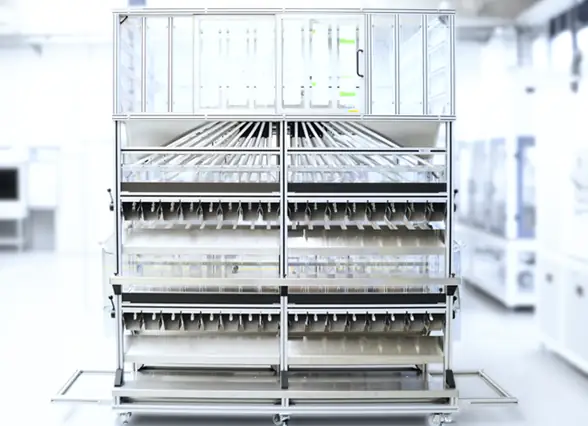 Modular separation station made of aluminum profiles featuring multi-tier sorting compartments and guide rails in an industrial facility.